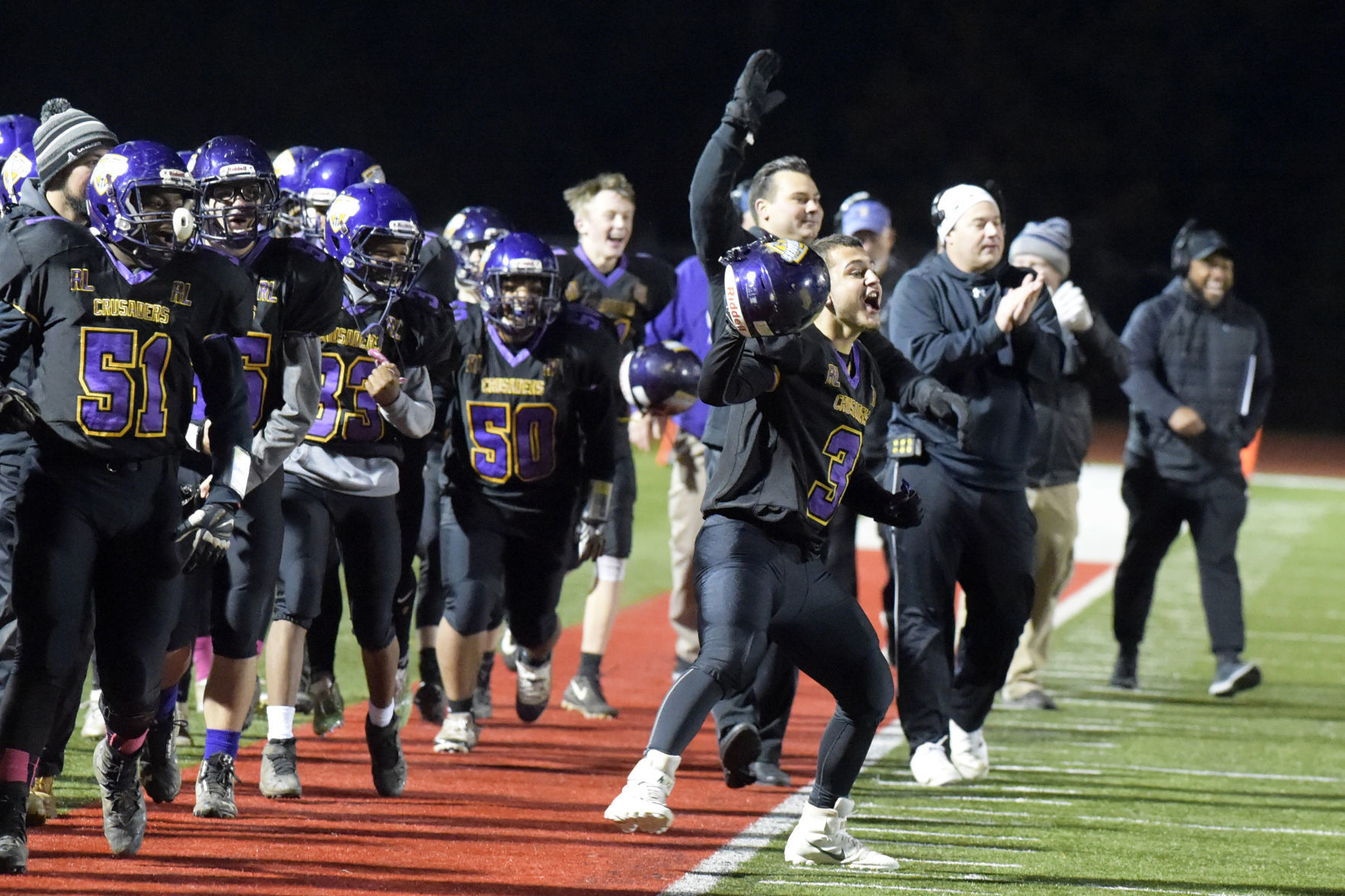 Celebrating a long playoff fumble return by Russell Gentry